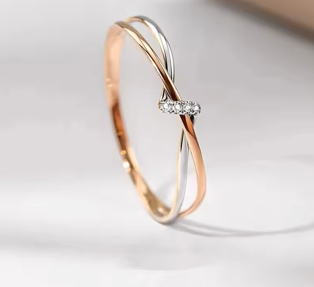 Elegant Two-Tone Twisty Ring with Brilliant Cubic Zirconia